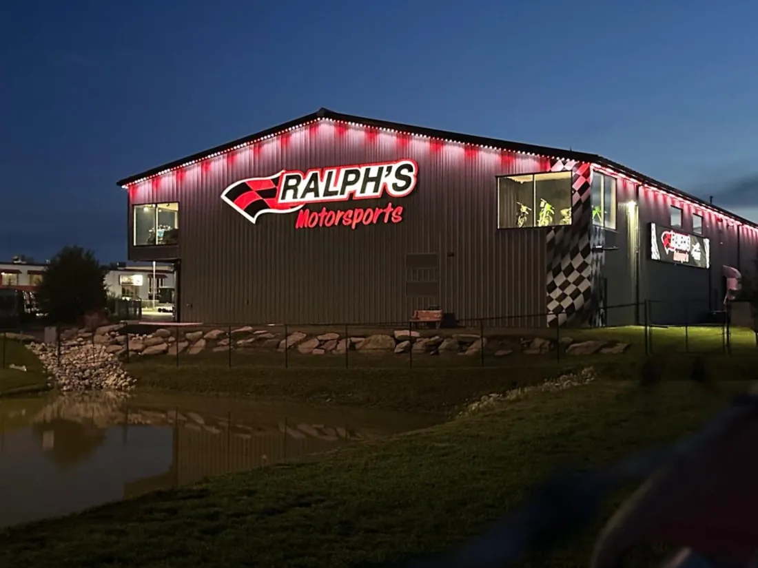 Calgary commercial building lit in brand red permanent LED lighting after dark